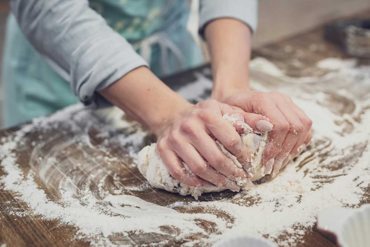 Kneading dough on a kitchen counter top